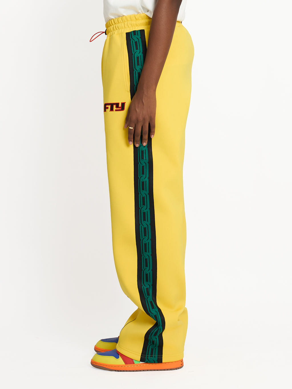 FTY TEAR CHAIN TRACK PANTS - YELLOW